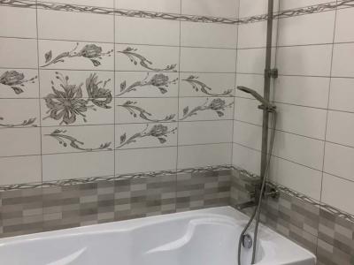 Облицовка стен плиткой в ванной комнате